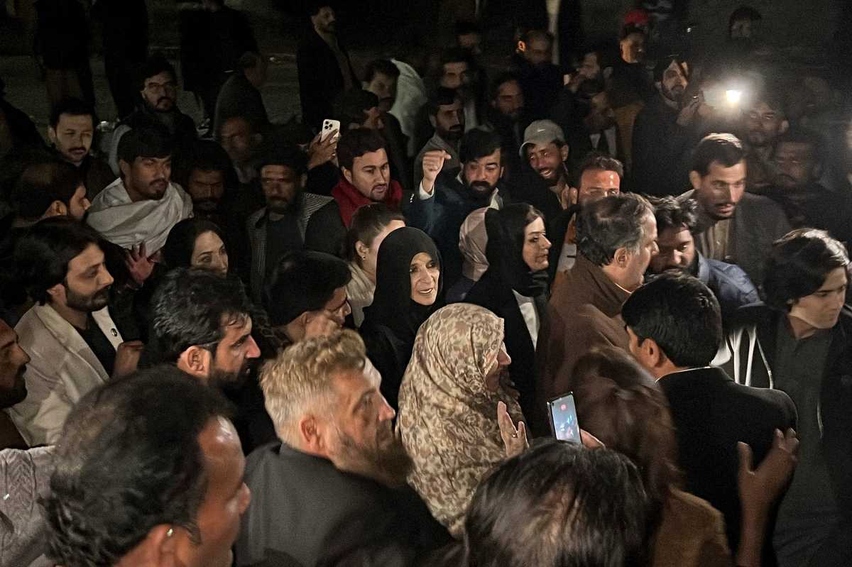 Imran Khan’s sister says former PM is healthy but cut off in jail