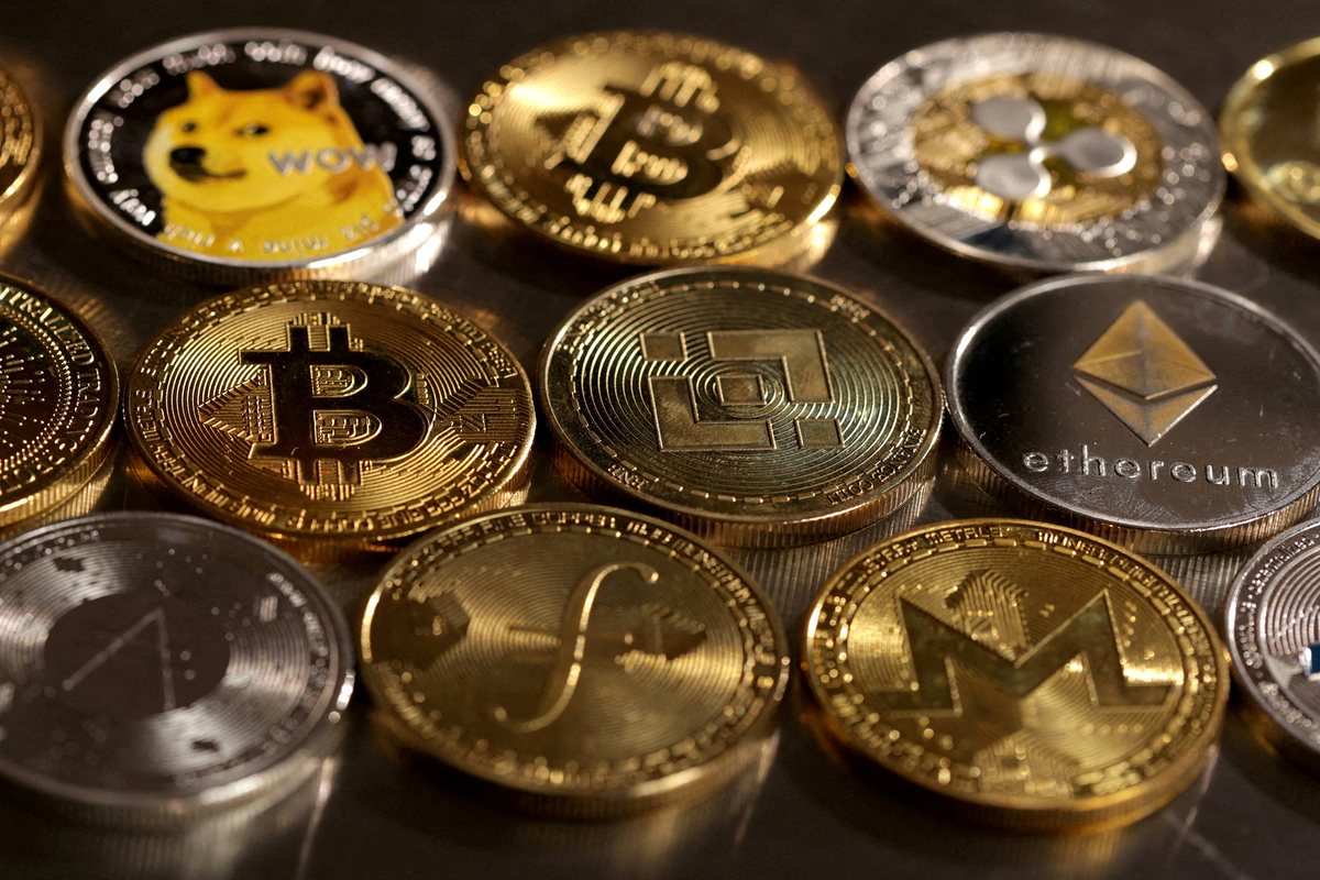 Various cryptocurrency coins, including Bitcoin and Ethereum, displayed closely together.